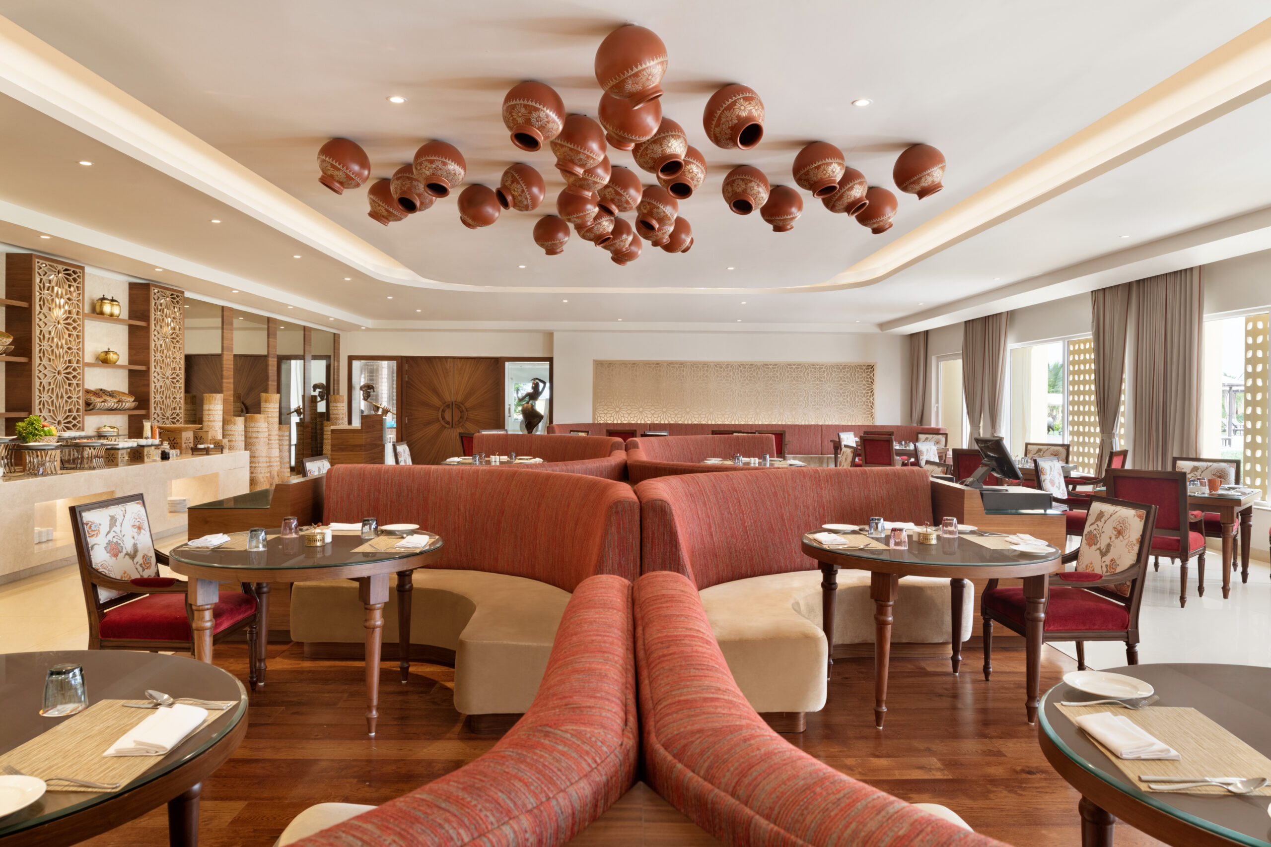 Satvik multicuisine restaurant seating area at Hawthorn Suites Dwarka