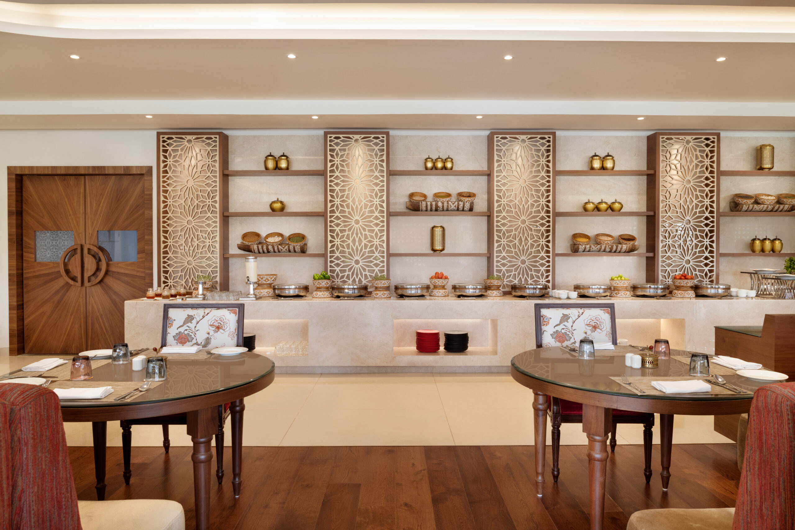 Satvik restaurant interior at Hawthorn Suites Dwarka
